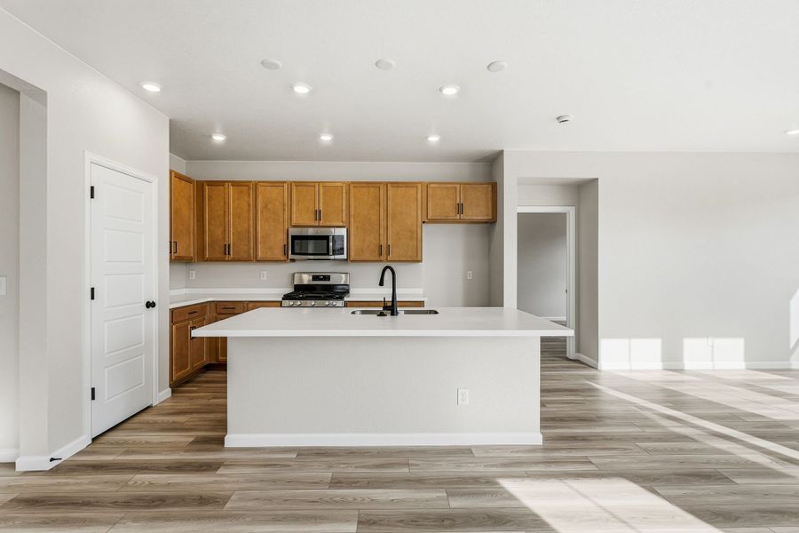 Furnished interior view inside a new home in The Aurora Highlands, Aurora (Image 3).