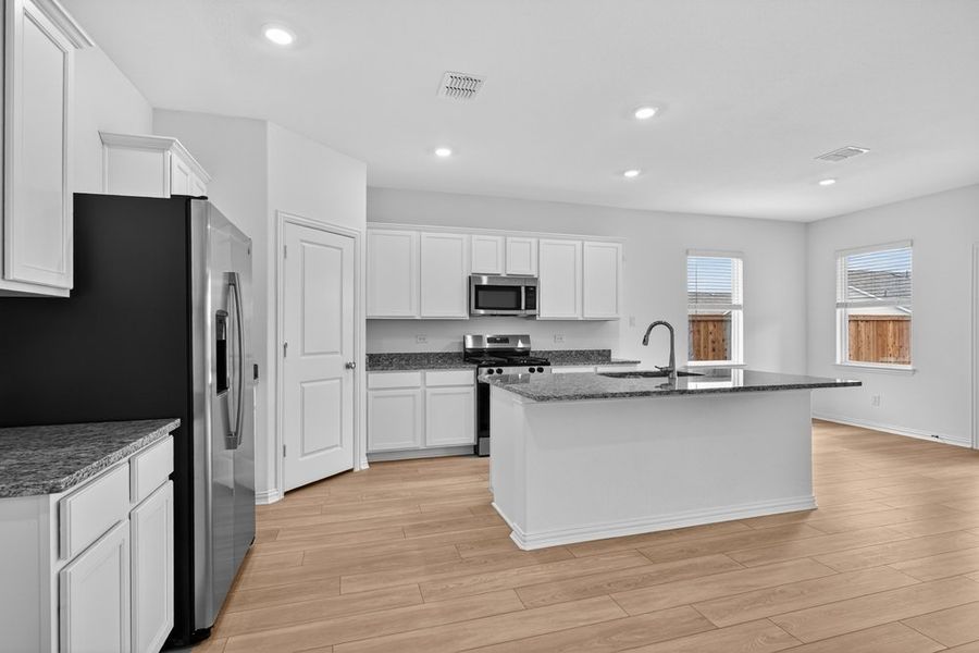Furnished interior view inside a new home in River Ridge, Crandall (Image 5).