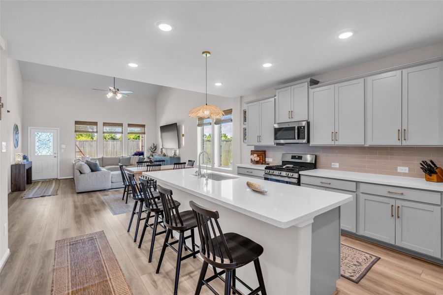 Its open design allows the kitchen to flow naturally into the main living spaces.