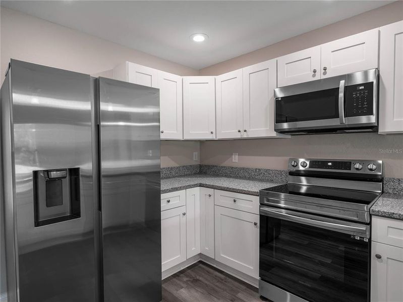 Kitchen. Photos of a completed model. Actual finishes of this home home may not be the same as portrayed in these photos.