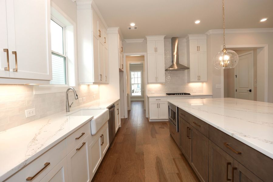 Representative furnished interior of a home built from the The Maddox by The Providence Group in Bellmoore Park, Johns Creek (Image 11).