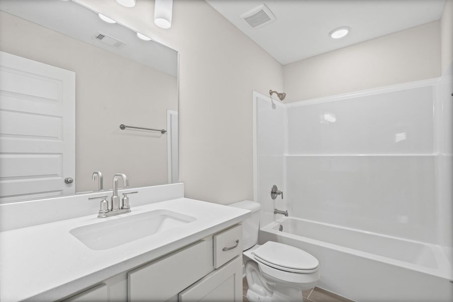 Full bath with tub / shower combination and vanity