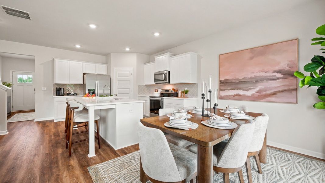 Representative furnished interior of a home built from the HAYDEN Express by D.R. Horton in Teamon Pointe, Griffin (Image 8).