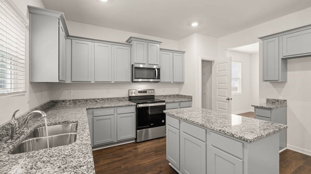 Representative furnished interior of a home built from the Packard by D.R. Horton in Evergreen Crossing, Locust Grove (Image 8).