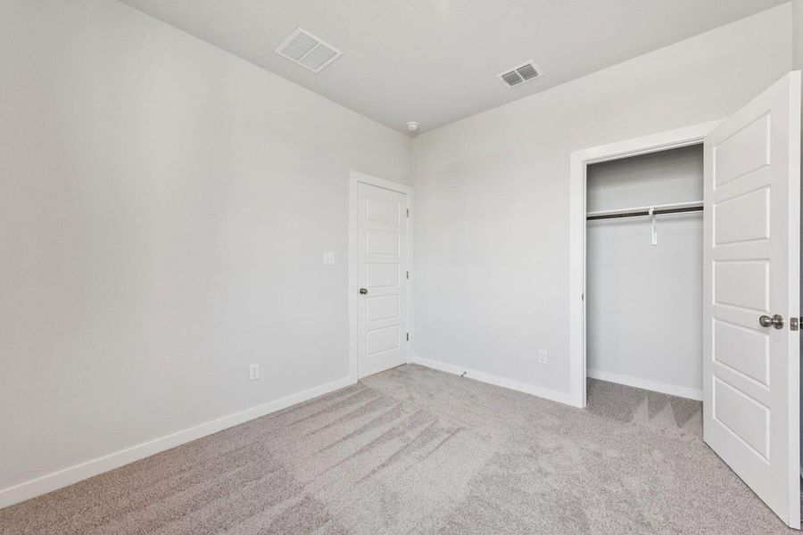 Spacious, unfurnished interior of a new home in Stallion Run, Buda (Image 21).