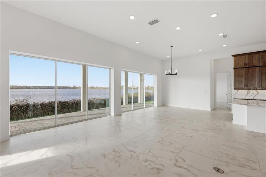 Spacious, unfurnished interior of a new home in Shorefront Cove, Winter Garden (Image 6).