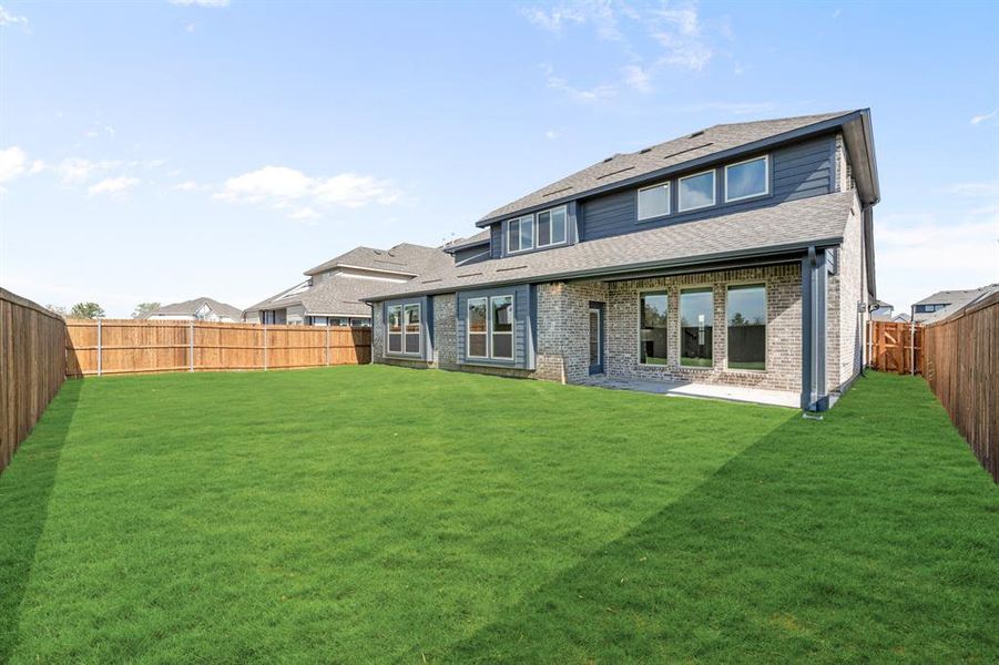 Exterior details and patio area of a home in Sonoma Verde, McLendon-Chisholm (Image 19).