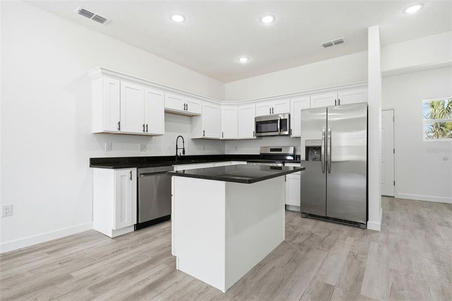 Furnished interior view inside a new home in , Haines City (Image 42).