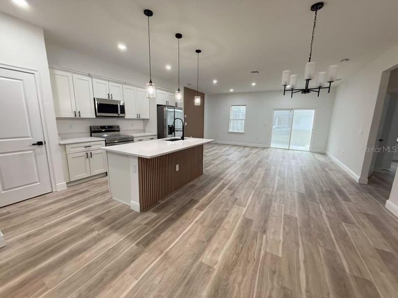 Furnished interior view inside a new home in , Port Charlotte (Image 9).