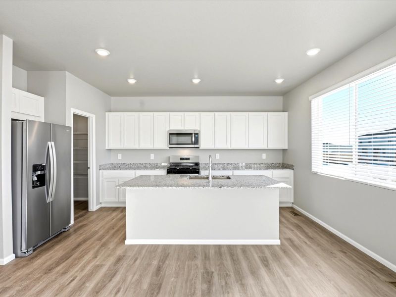 Furnished interior view inside a new home in Revere at Johnstown, Johnstown (Image 3).