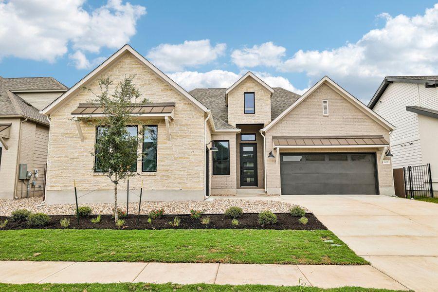 Representative exterior photo of a completed home built from the Allendale by Taylor Morrison in Silverleaf, Cedar Creek, TX (Image 24).