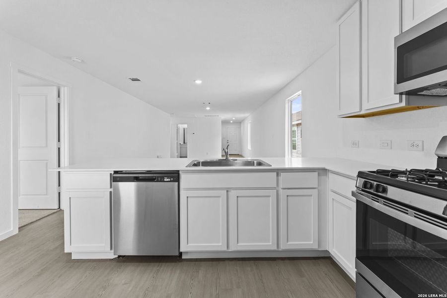 Furnished interior view inside a new home in Spring Grove, St. Hedwig (Image 6).