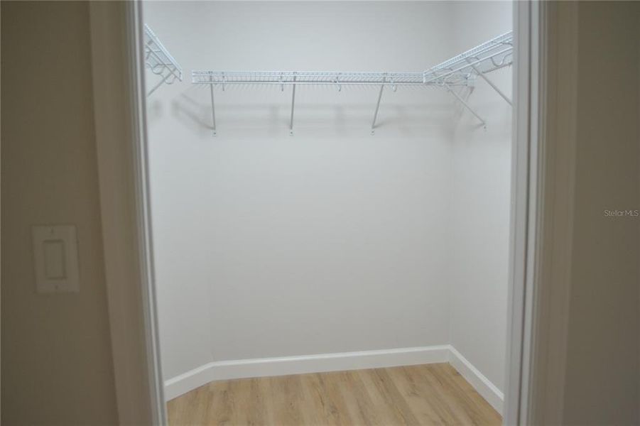 PRIMARY BEDROOM WALK-IN CLOSET