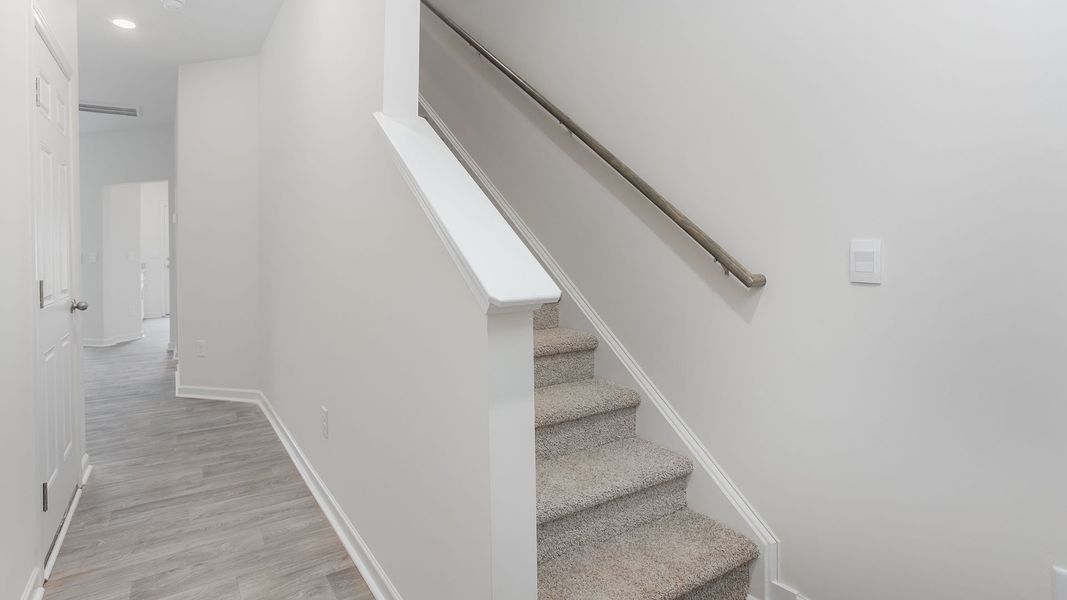 Spacious, unfurnished interior of a new home in The Gables at Edinborough Townes, Gibsonville (Image 9).