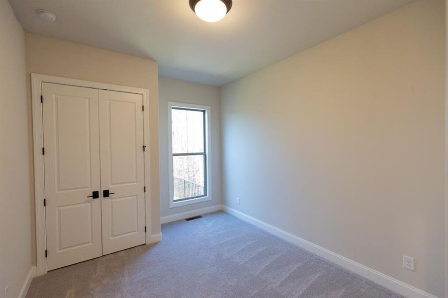 Spacious, unfurnished interior of a new home in Bellmoore Park, Johns Creek (Image 36).