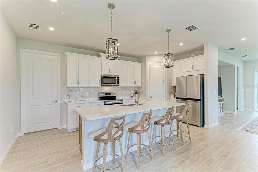 Furnished interior view inside a new home in Wellen Park, Venice (Image 5).