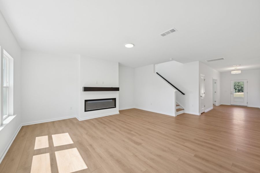 Representative unfurnished interior of a home built from the Jordan by Ashton Woods in Rowland's Grant, Fuquay Varina (Image 31).