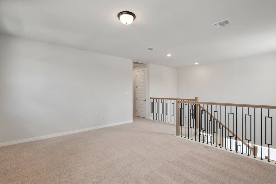 Spacious, unfurnished interior of a new home in Capitol Collection at Lariat, Liberty Hill (Image 37).