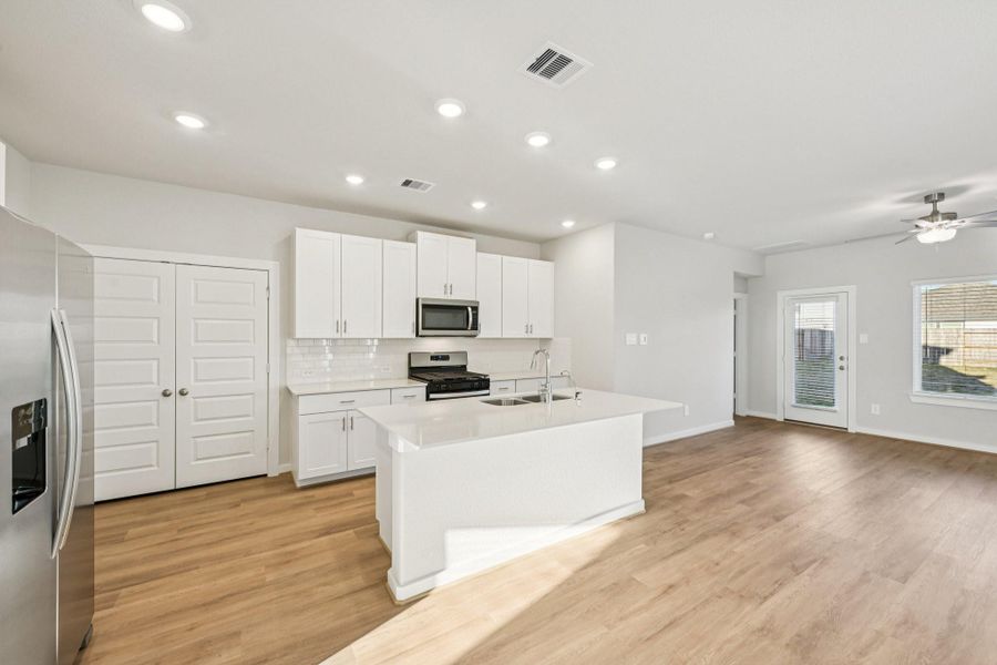 Furnished interior view inside a new home in Landing Meadows - Traditional Series, New Caney (Image 16). Furnished interior view inside a new home in Landing Meadows - Traditional Series, New Caney (Image 16).