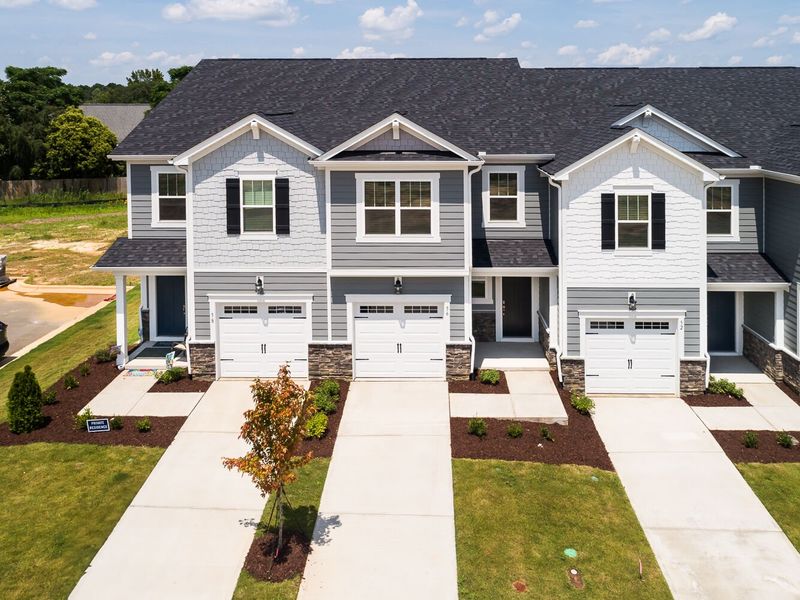 Front exterior of a new home in Vaughan Farms, Angier, NC, highlighting curb appeal (Image 2).