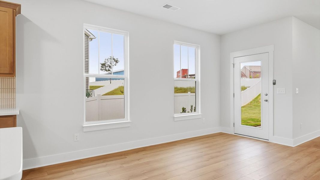 Inviting breakfast area with a seamless connection to the kitchen for everyday living by DRB Homes