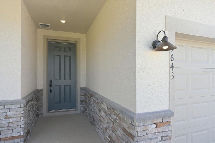 Exterior details and patio area of a home in Tyson Reserve, St. Cloud (Image 3).