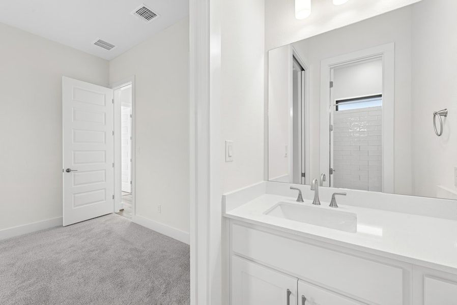 Furnished interior view inside a new home in Riverstone, Georgetown (Image 15).
