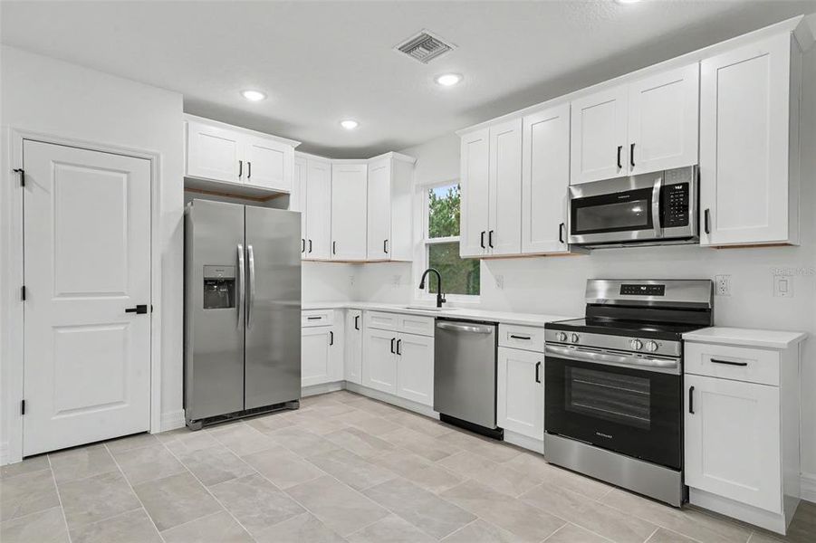 Furnished interior view inside a new home in , Avon Park (Image 8).