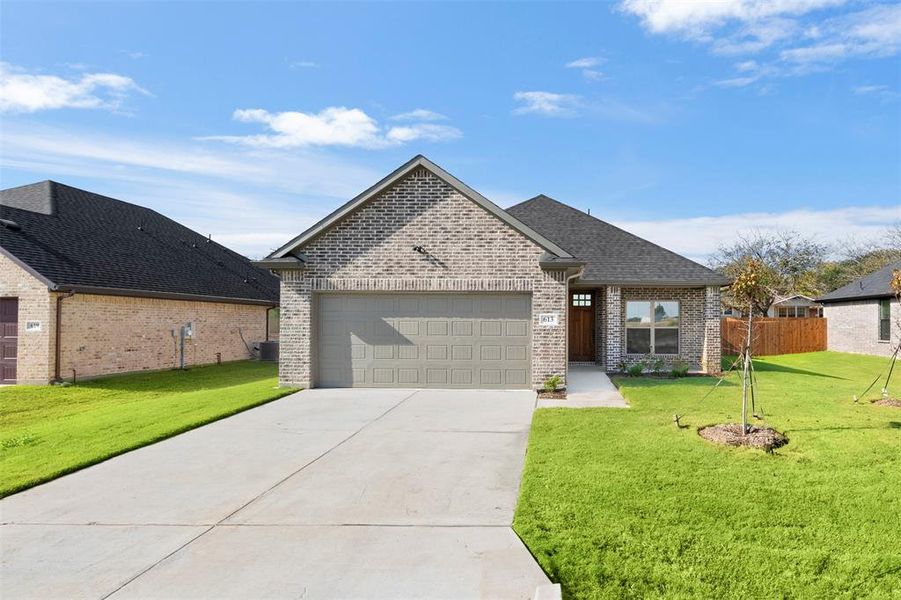 Front exterior of a new home in , Italy, TX, highlighting curb appeal (Image 1).