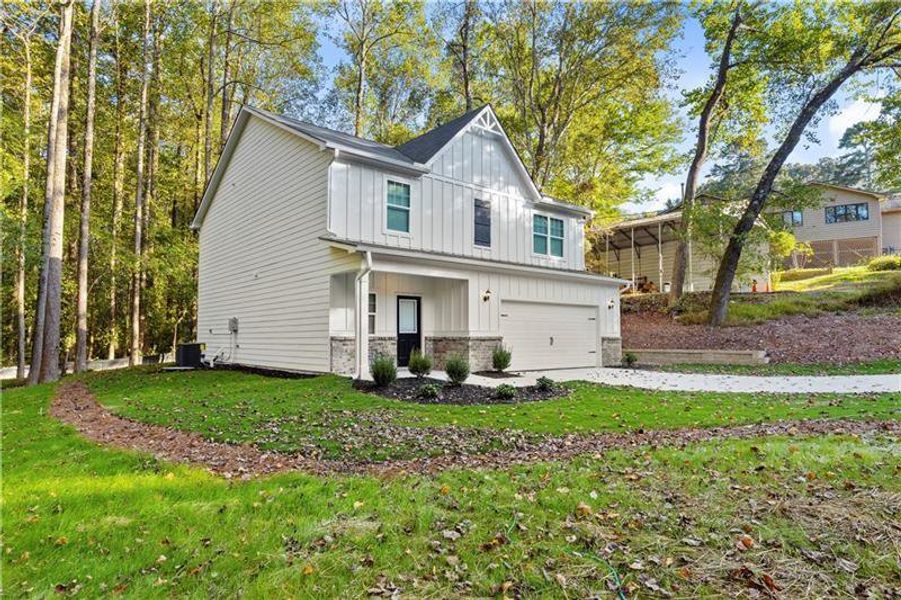 Front exterior of a new home in , Buford, GA, highlighting curb appeal (Image 21).