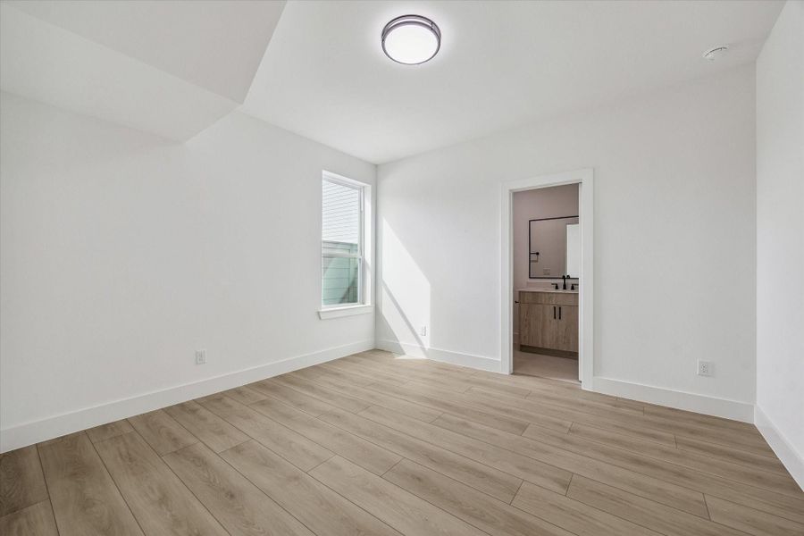 Bright bedroom with clean finishes and a calm, neutral palette Bright bedroom with clean finishes and a calm, neutral palette