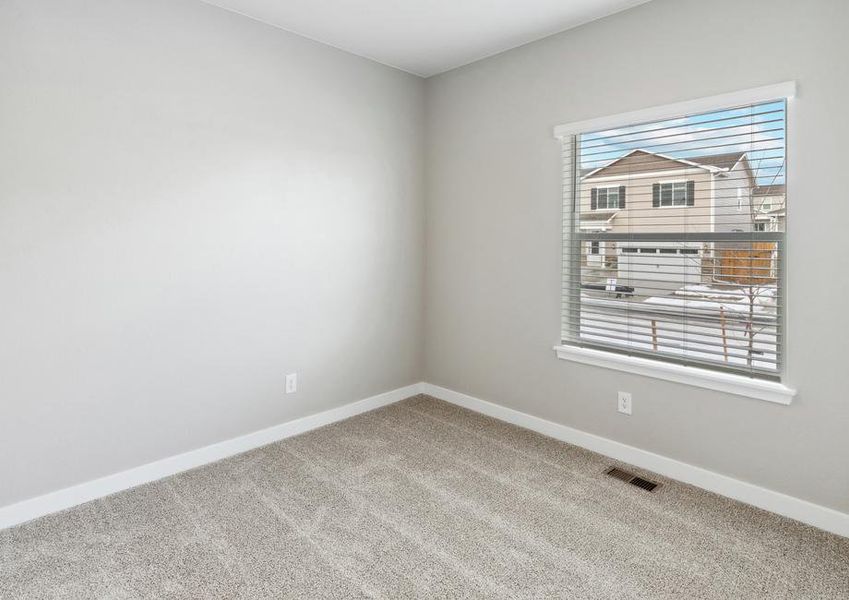 The third bedroom of the Chatfield plan is best used as a child's bedroom or as an office space.