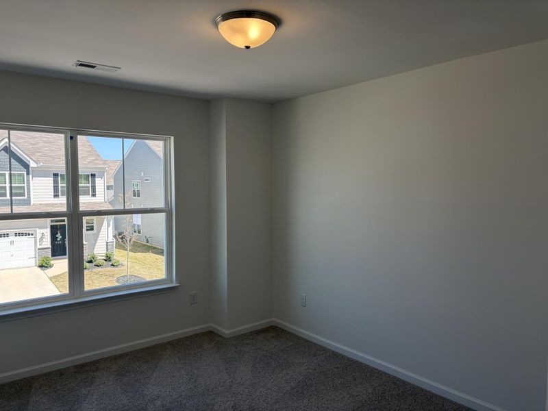 Spacious, unfurnished interior of a new home in Riverbrooke Townhomes, Simpsonville (Image 10).