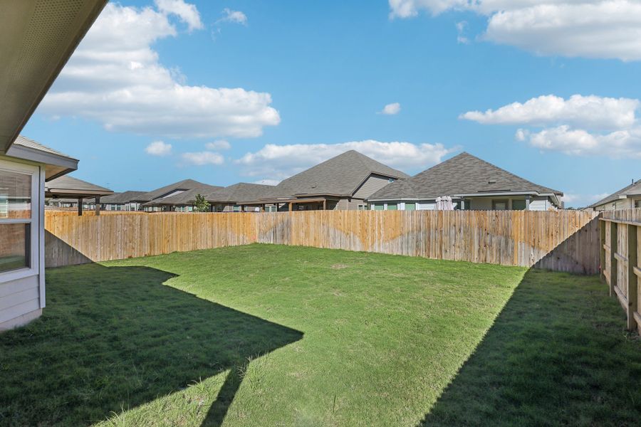 Back exterior of the Oleander floorplan at a Meritage Homes community. Back exterior of the Oleander floorplan at a Meritage Homes community.