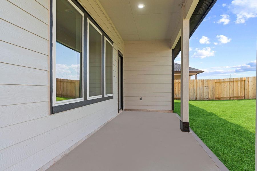Exterior details and patio area of a home in Tamarron, Fulshear (Image 26).