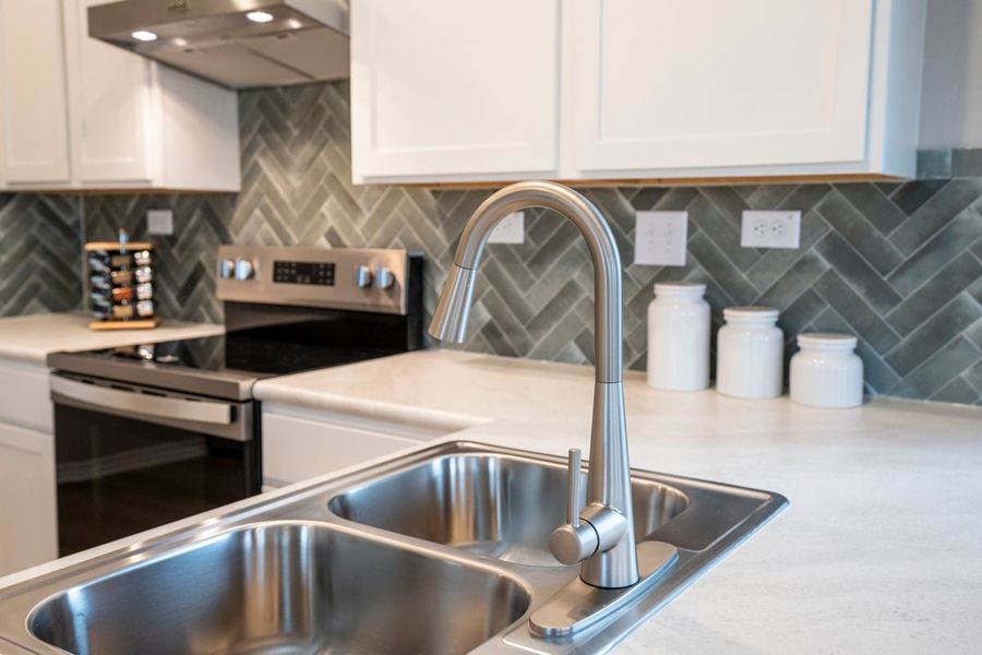 Optional high-arc faucet