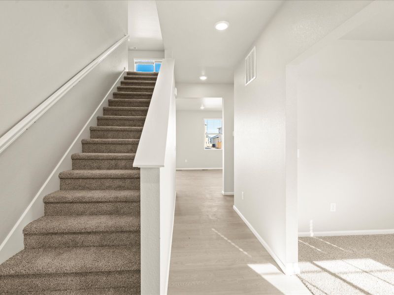 Spacious, unfurnished interior of a new home in Poudre Heights: The Lakes Collection, Windsor (Image 13).
