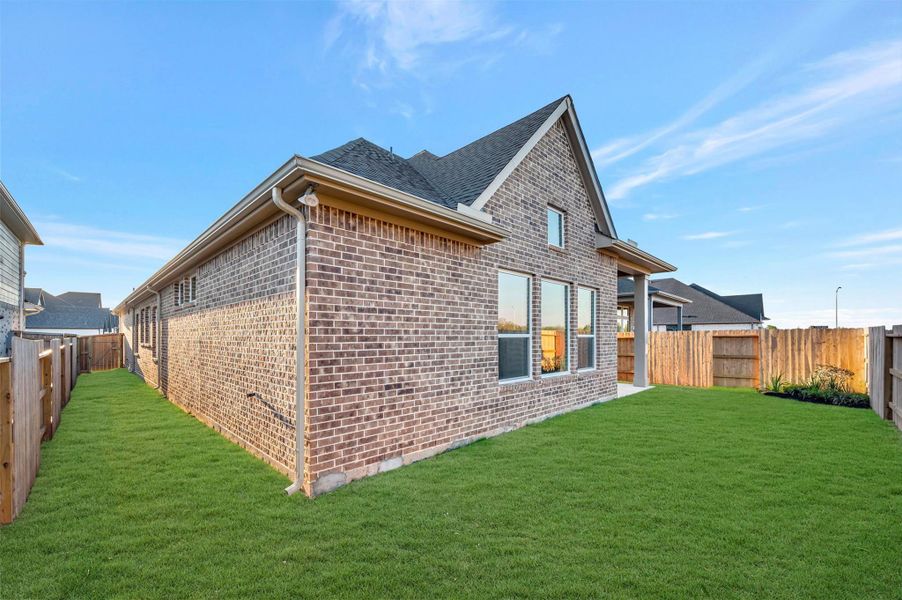 Exterior details and patio area of a home in Grange 45' Homesites, Katy (Image 4).