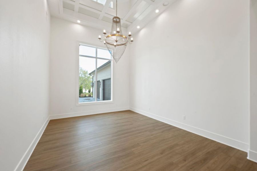 Formal dining with mirror Inlays on the ceiling.