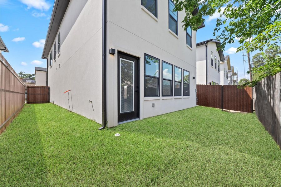 Exterior details and patio area of a home in , Houston (Image 3). Exterior details and patio area of a home in , Houston (Image 3).
