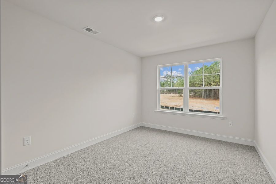 Spacious, unfurnished interior of a new home in Canterbury Villas, Carrollton (Image 32).