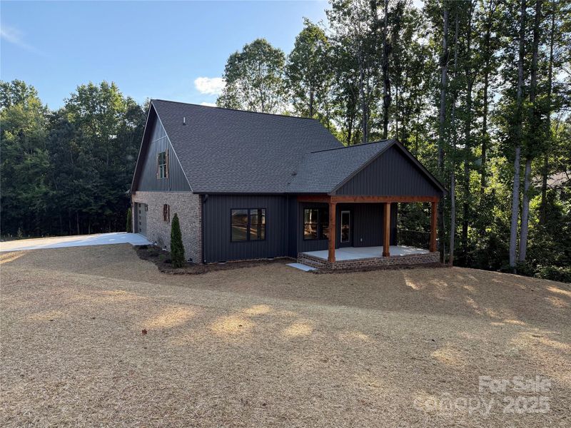 Front exterior of a new home in , Hildebran, NC, highlighting curb appeal (Image 14).
