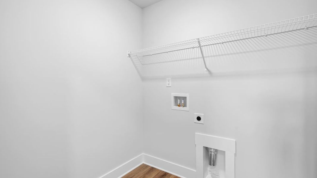 2 story single family home, all white, laundry room