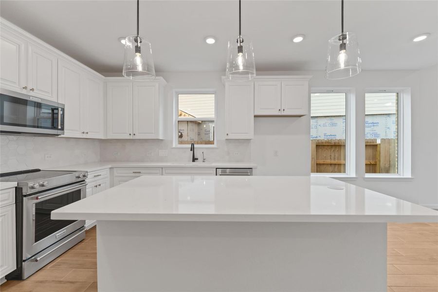 Furnished interior view inside a new home in Sunterra, Katy (Image 7).