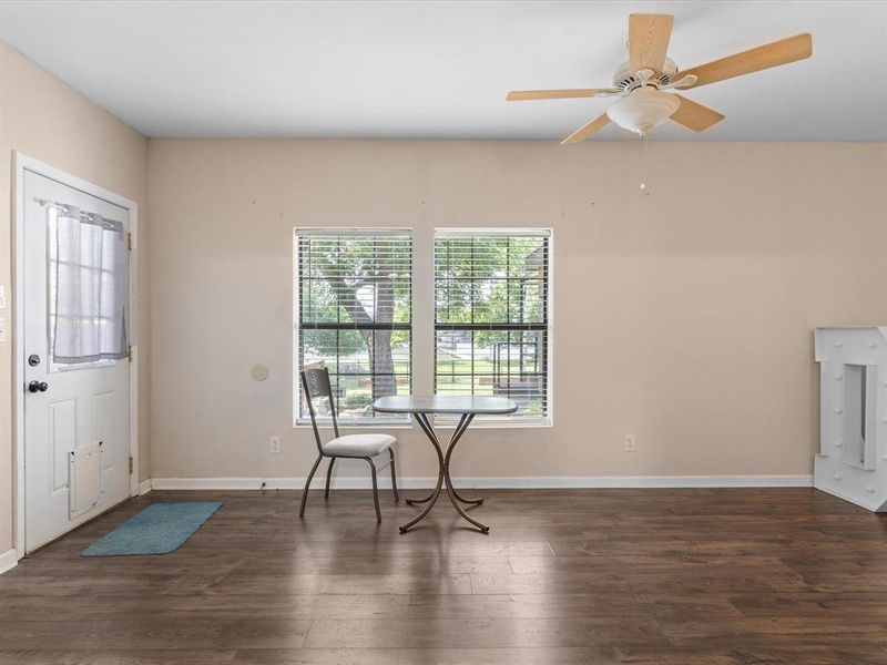 Entryway featuring wood finished floors and ceiling fan Entryway featuring wood finished floors and ceiling fan