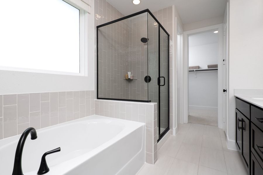 Representative furnished interior of a home built from the Victoria by Tri Pointe Homes in Painted Tree, McKinney (Image 14).