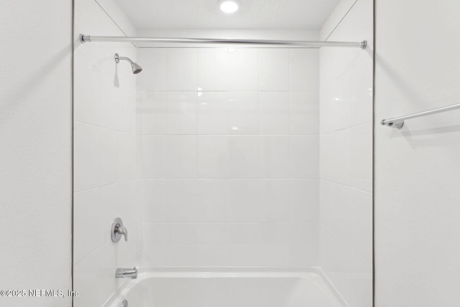 Furnished interior view inside a new home in Lakes at Bella Lago - Signature Series, Green Cove Springs (Image 9). Furnished interior view inside a new home in Lakes at Bella Lago - Signature Series, Green Cove Springs (Image 9).