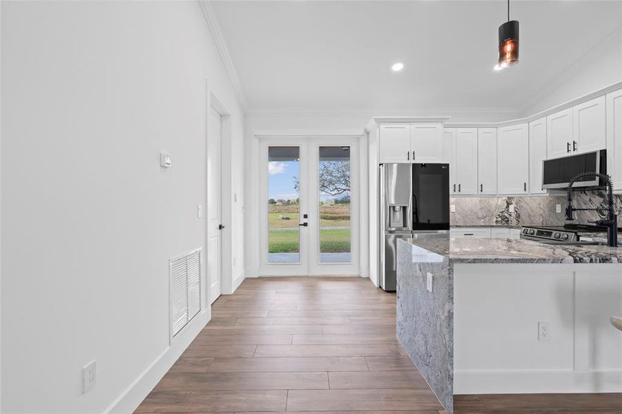 Furnished interior view inside a new home in , Okeechobee (Image 3).