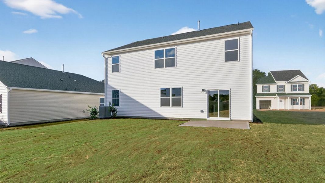 Exterior details and patio area of a home in Honeycutt Oaks, Angier (Image 3).