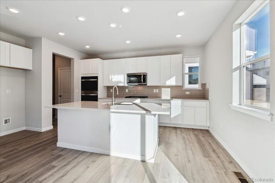 Furnished interior view inside a new home in Floret Collection at Alder Creek, Parker (Image 5). Furnished interior view inside a new home in Floret Collection at Alder Creek, Parker (Image 5).